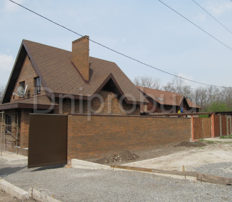 Будинок, облицьований клінкерною цеглою в с. Любимівка (1L)